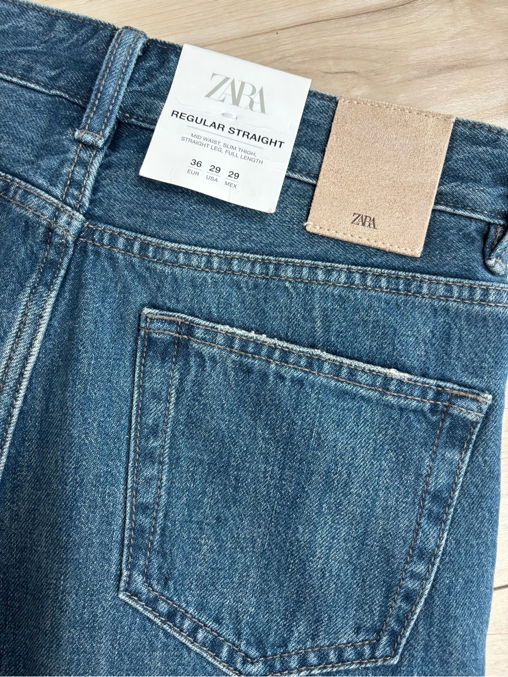 ZARA Straight-Leg Jeans in Medium Blue with Tan Patch